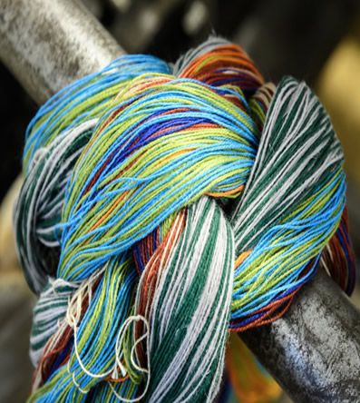 A multi-coloured ball of textiles