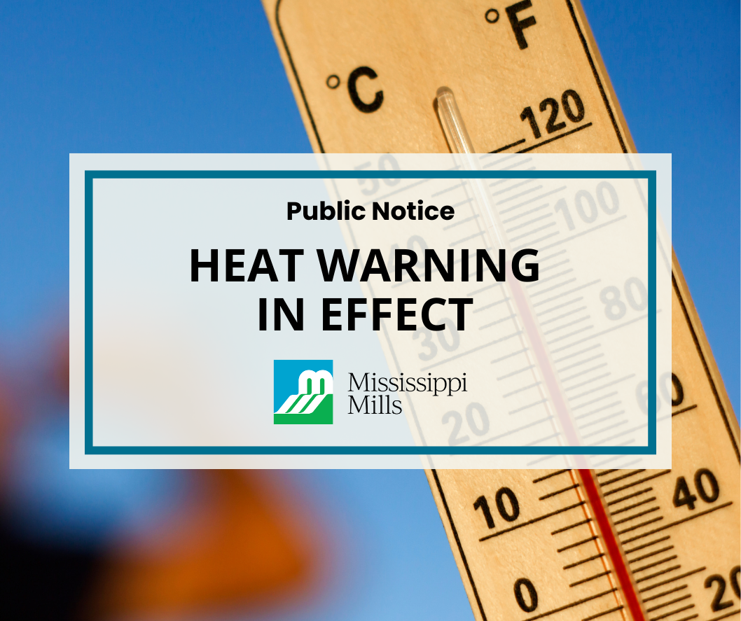 Graphic with photo of a thermometer and the text 'Heat Warning in Effect'