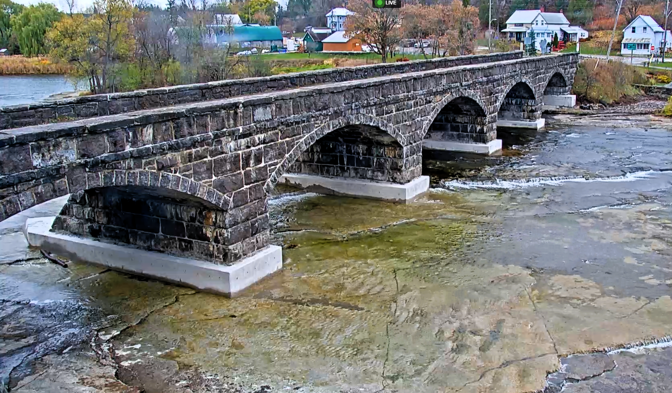 Photo of stone bridge in fall