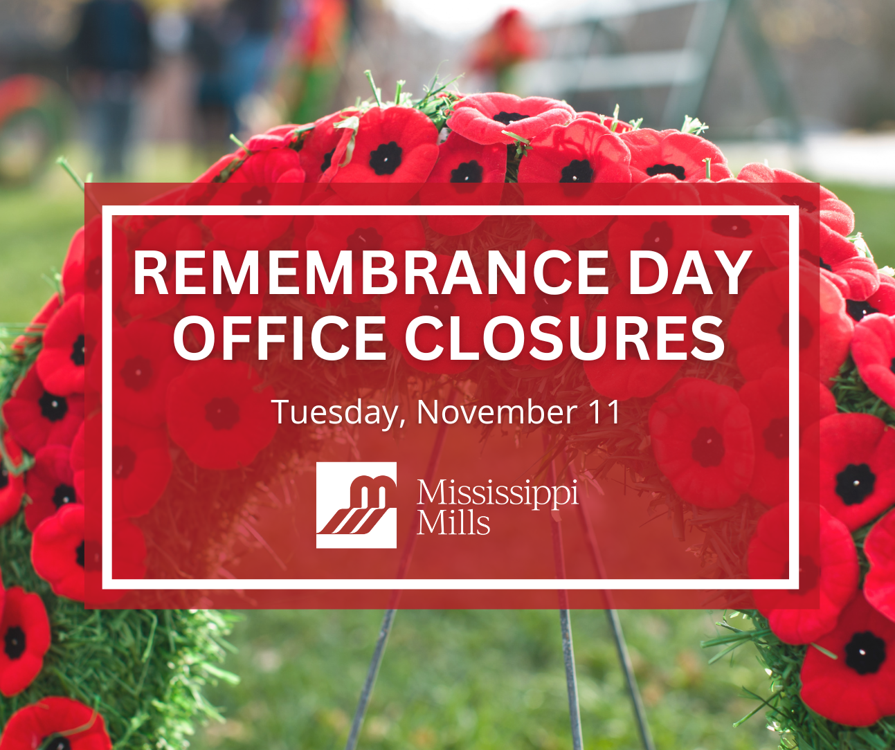 Photo of wreath covered in poppies with the text 'Remembrance Day Office Closures - Tuesday, November 11'