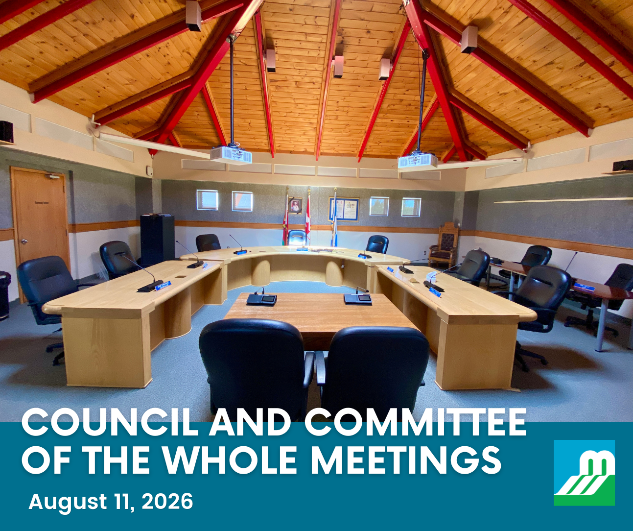 An empty Council Chambers with desks shaped in a horseshoe and a wooden plank ceiling. A blue box with white text reads 'Council and Committee of the Whole Meetings - August 11, 2026.'
