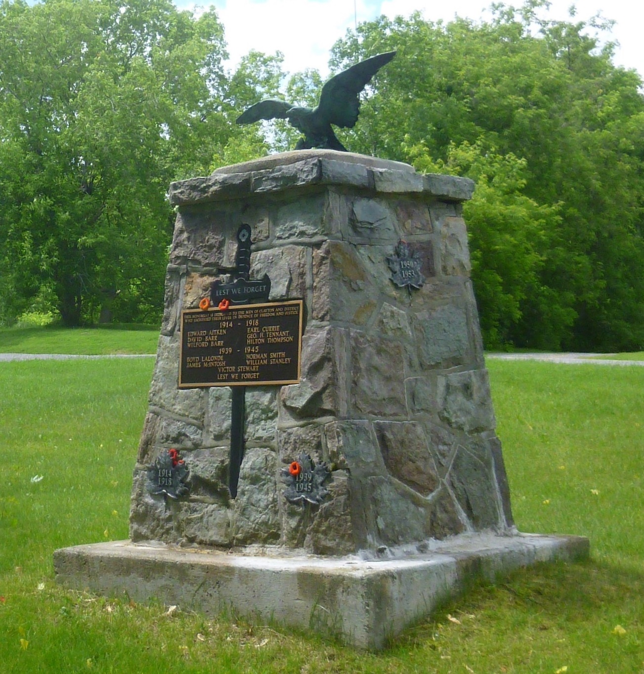 Photo of a stone cenotaph in a park