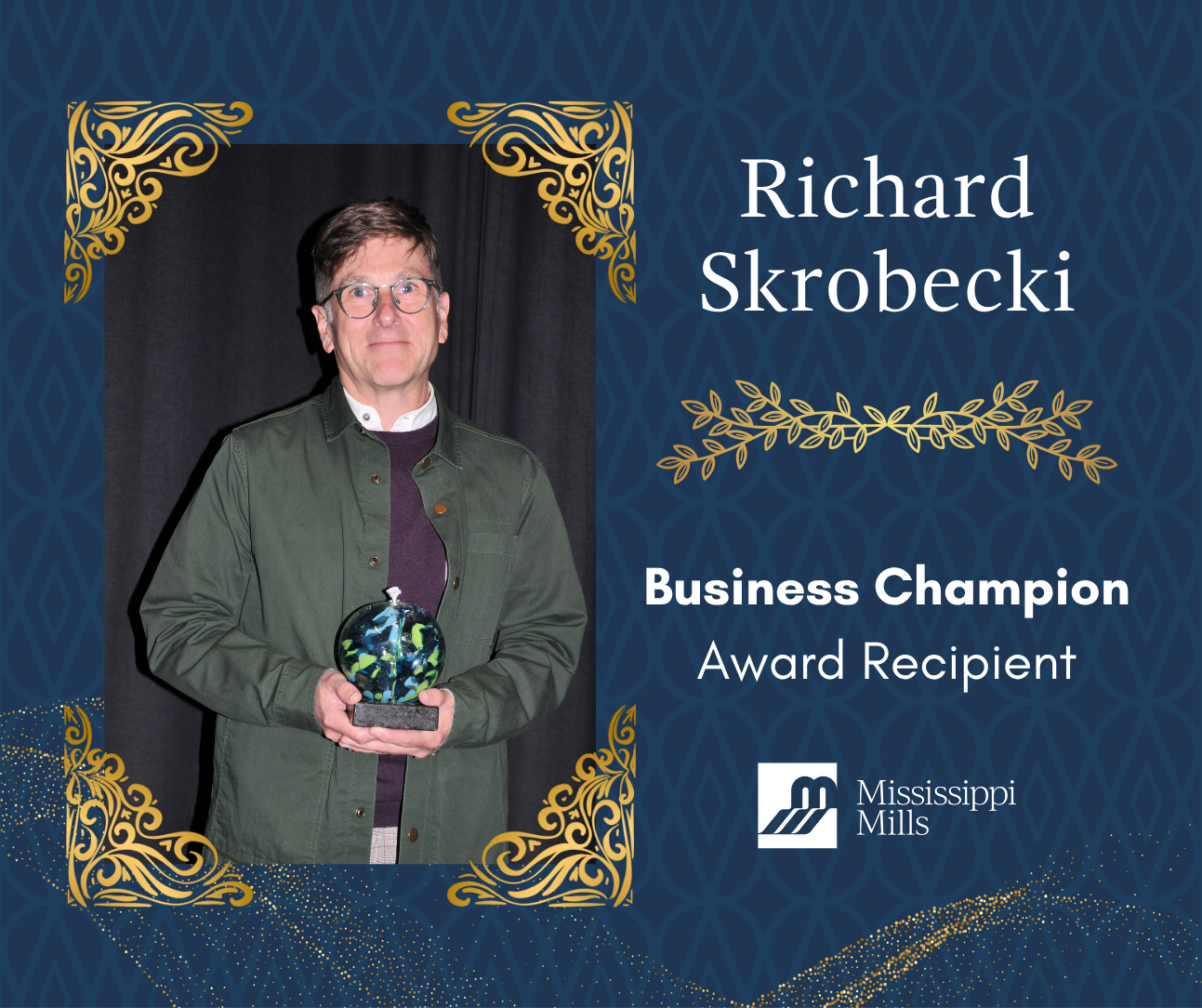 Navy and gold graphic with a photo of a man holding award and text: 'Richard Skrobecki, Business Champion Award Recipient'