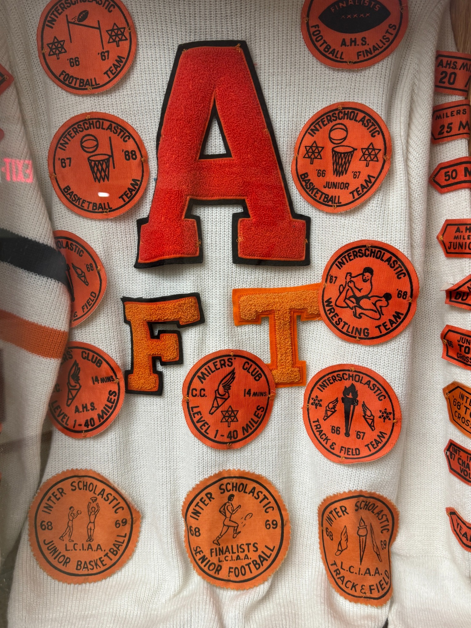 White and orange memorabilia from Almonte District High School